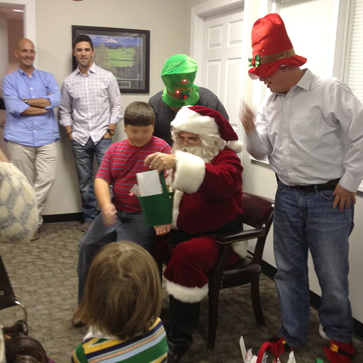 Oncology Supply associates giving at a children's home